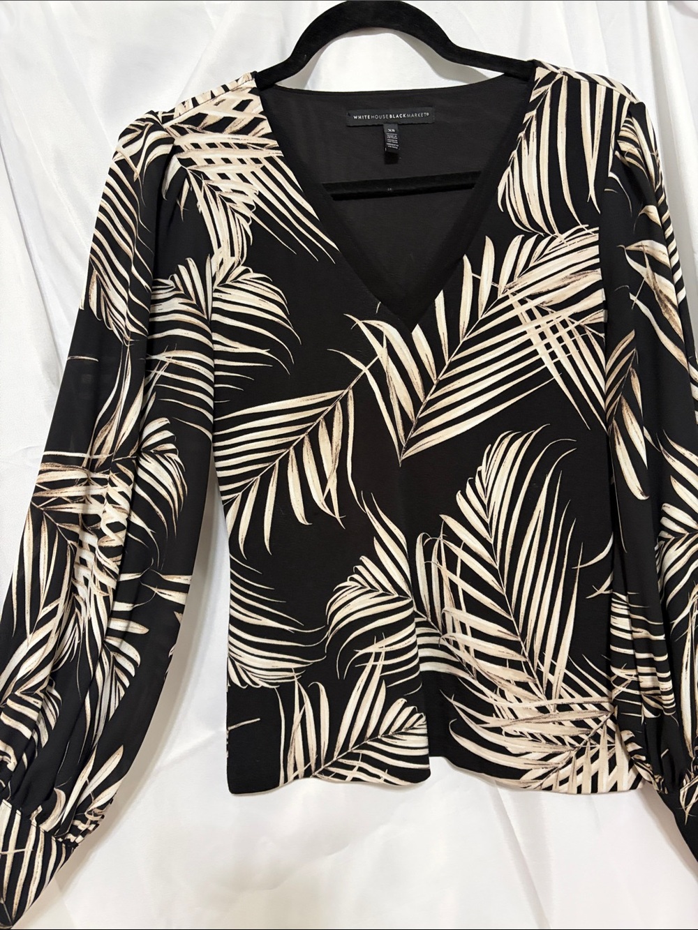 White House, black market, black V-neck blouse with balloon like sleeves